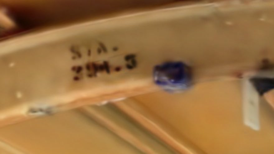 Detail from the scan: a station marking on a fuselage frame