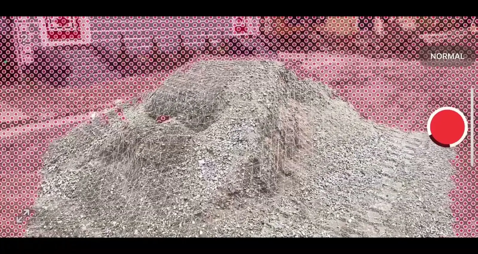The LiDAR mesh forming over a gravel pile during the scan, with the record button and scan mode on screen