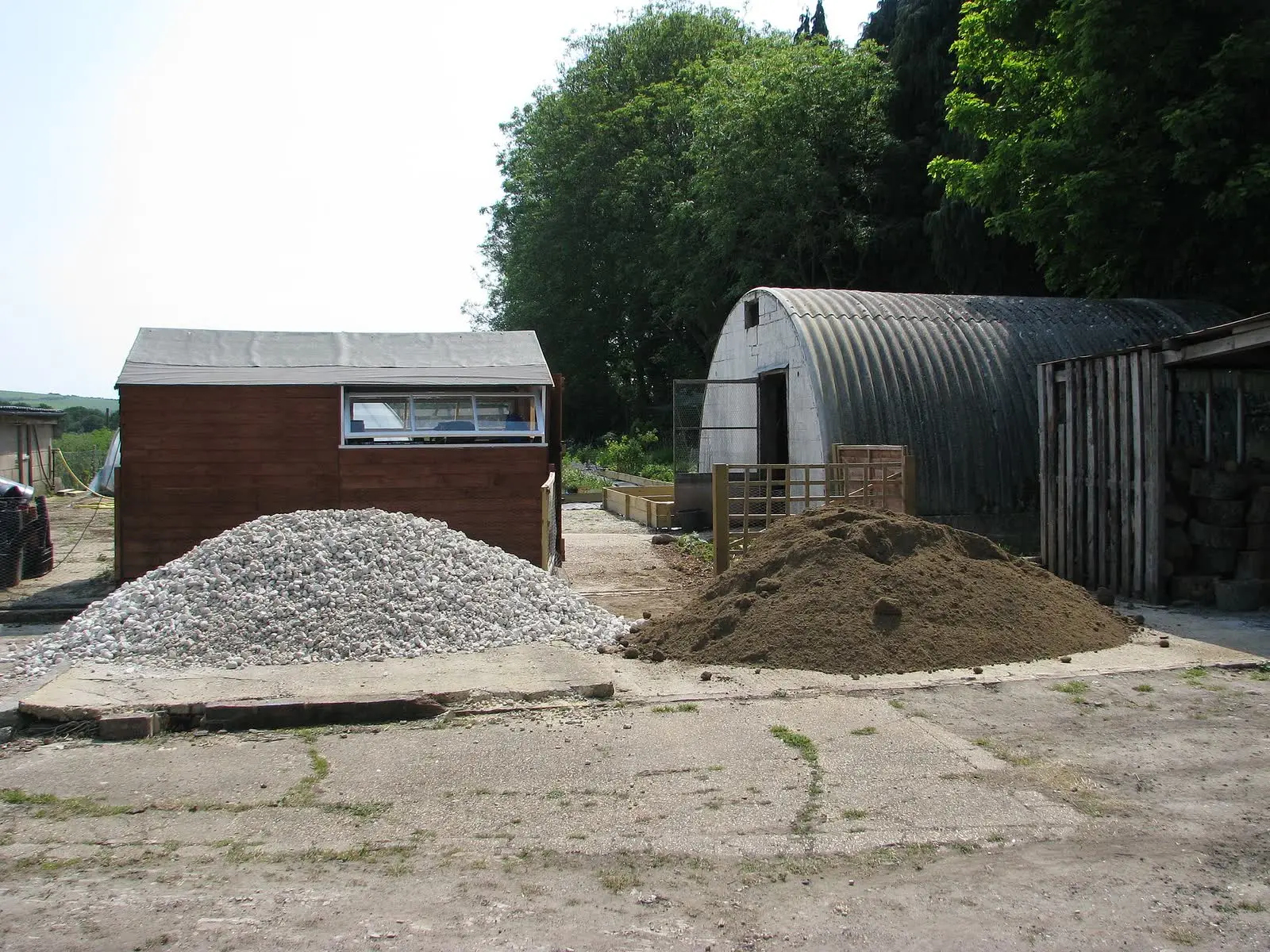Heaps of gravel and sand in a supply yard